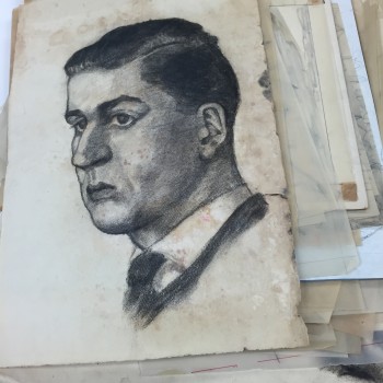 A charcoal sketch of a man's face done on glassine paper. This is possibly a self-portrait of the artist circa the 1920s. 