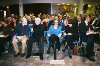 A group photo of the celebration had for William Gass in the Whispers Cafe of the John M. Olin Library, October 2004. 