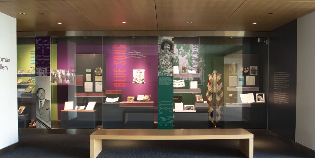 A photo of the Lasting Legacies exhibition on display at the Thomas Gallery on Level 1 of Olin Library.