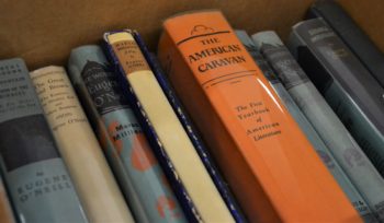 Closeup of book spines within the Eugene O'Neil Collection.