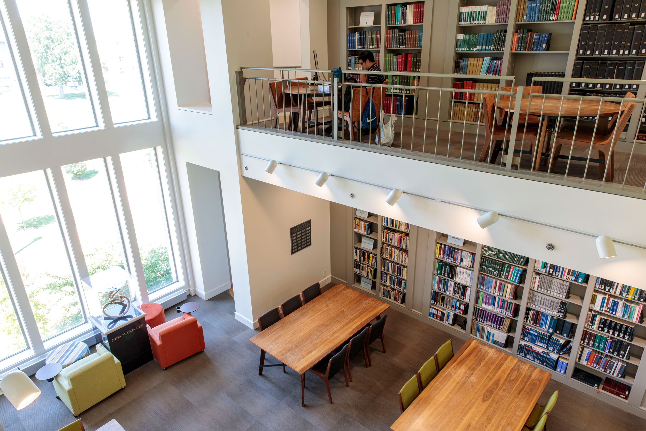 A photo of the second floor of the Kopolow Business Library looking down into the first floor.