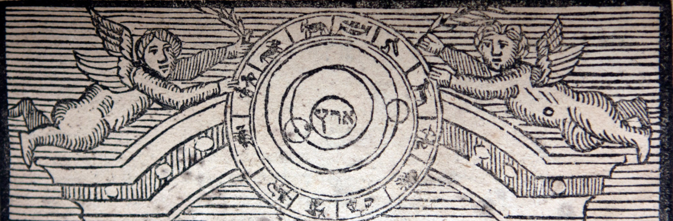 A close up of an illustration of cupids around a circular calendar.