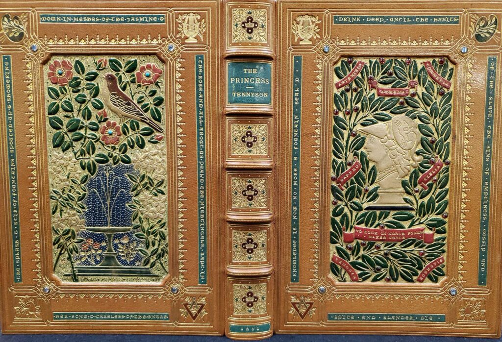 The binding is done in a beautiful, pale leather with colorful decorations stamped into it. The books front cover has a bust stamped into the middle surrounded with lush green olive branches and other decorations in all four corners. The back cover is stamped with a gorgeous fountain surrounded by a bird and two types of flowers alongside it.