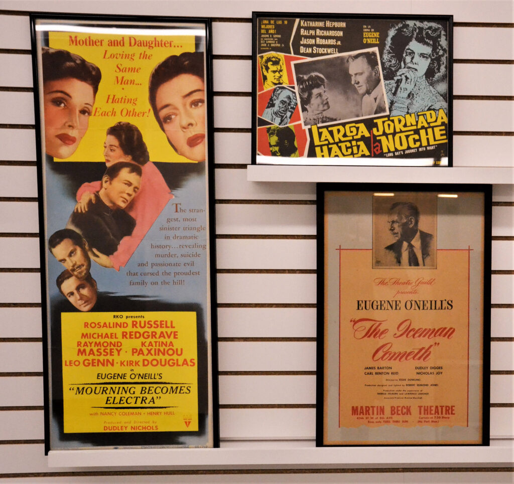 Three movie posters for film adaptations of Eugene O'Neil's printed works. The movies are "Mourning Becomes Electra," "The Iceman Cometh," and the Spanish version of "Lond Day's Journey into Night" or "Larga Jornada Hacia la Noche."