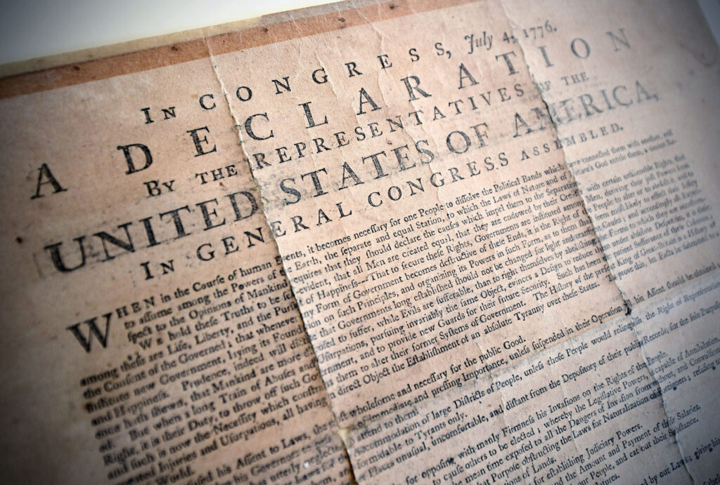 A closeup of a printed copy of the Declaration of Independence.