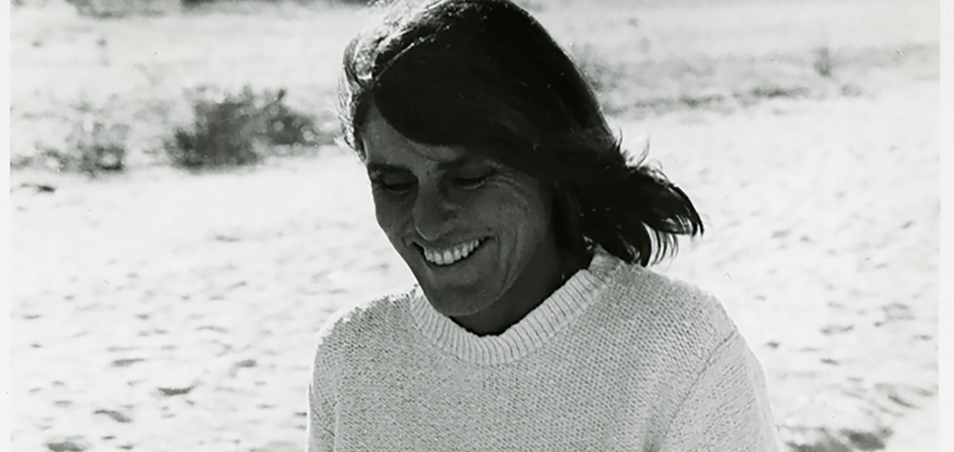 A cropped photo of Joy Williams on a beach.