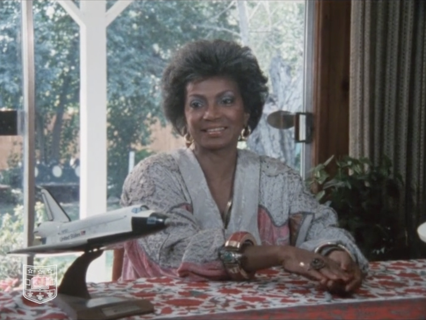 A photo of Nichelle Nicholas being interviewed by William Miles as part of Miles' Black Stars in Orbit documentary.