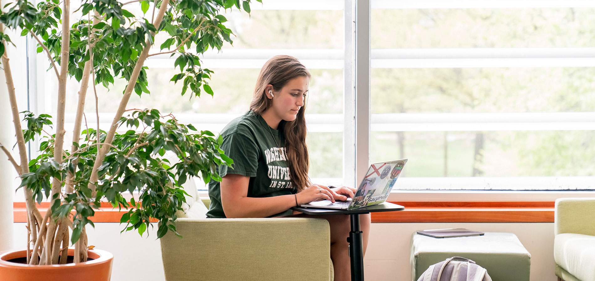 Student working in Olin Library