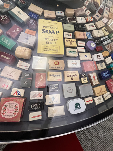 A photo of the Collect-O-Rama Case in Risa's Landing on Level 2 of Olin Library with the Stanley Elkin Pieces of Soap Collection on display.