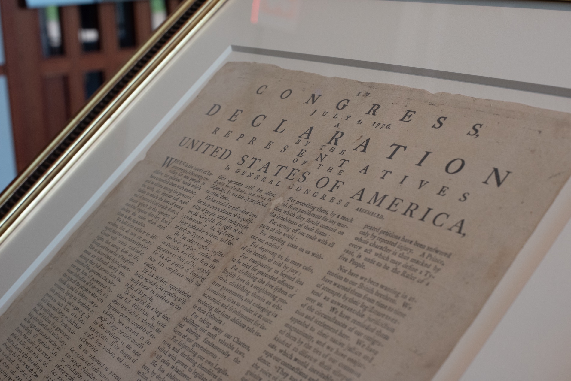 An original copy of the Declaration of Independence inside a glass frame