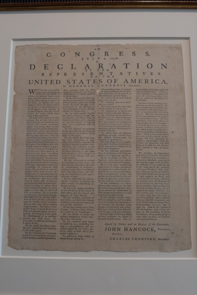 A copy of the Declaration of Independence inside a frame.