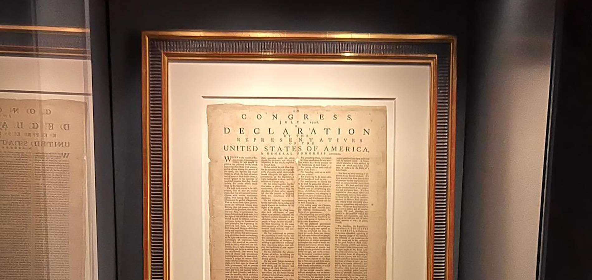 The Rogers Broadside on display in the Declaration of Independence Chamber of Olin Library.