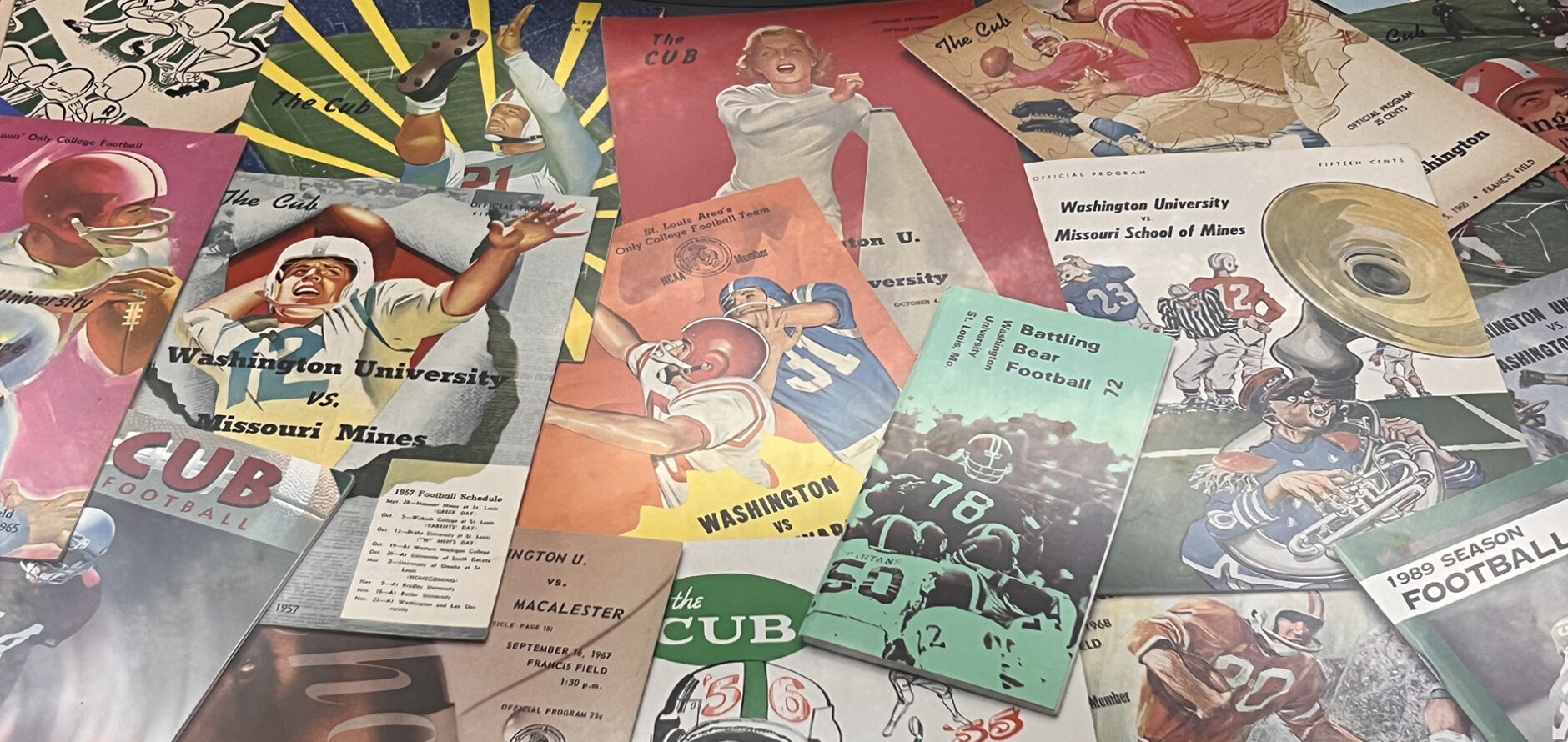 Close up of the Collect O'Rama display case showing Jason Marquart's Football Programs collection.