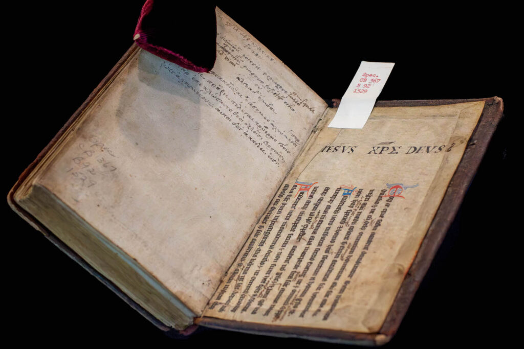 Open book with Latin script