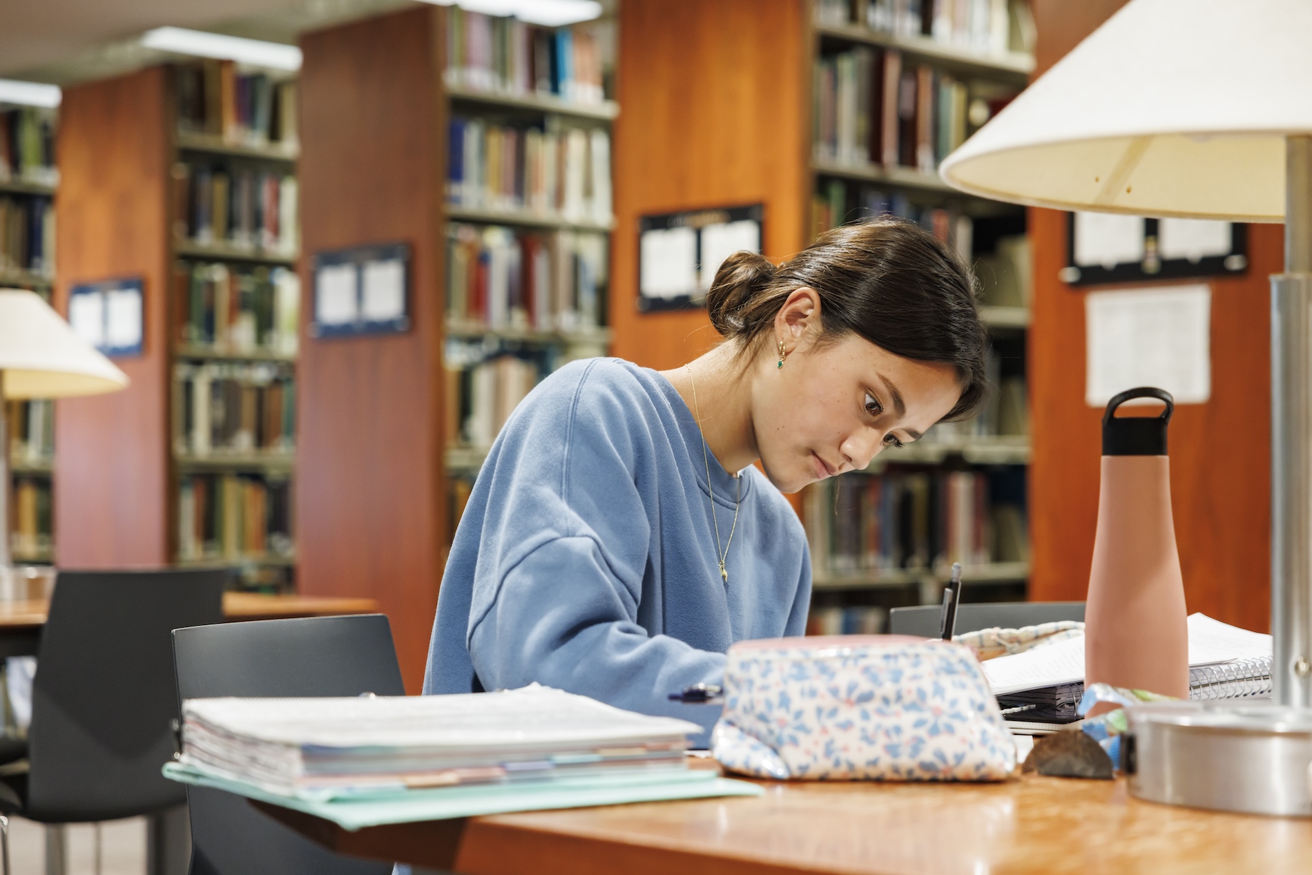 Student in Olin Library