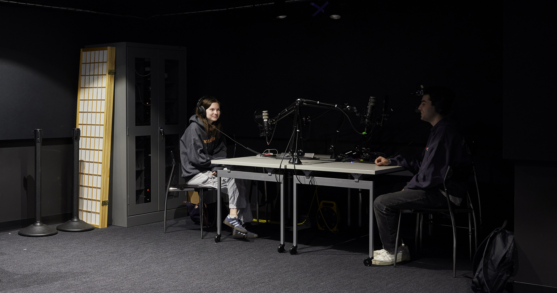 Students podcasting in AVA Studio on Level A of Olin Library.