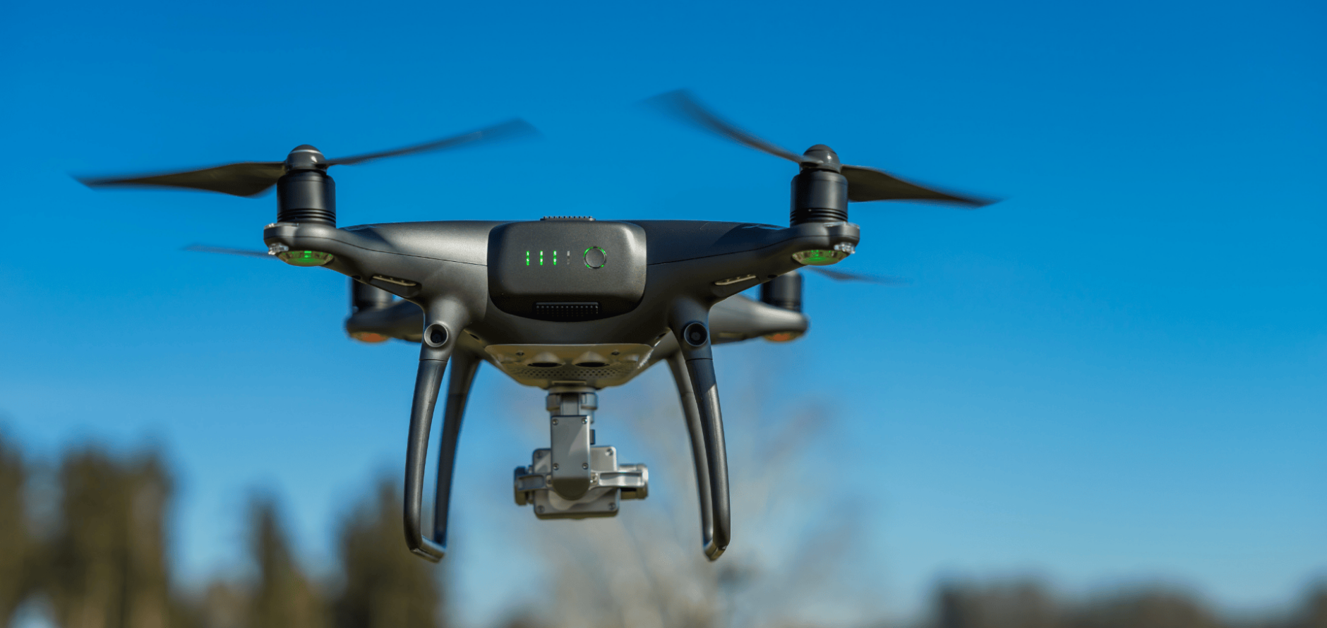 Stock image of a drone flying in the sky